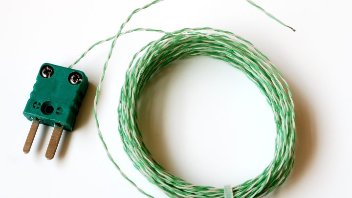A K-type thermocouple plug with coiled extension wire